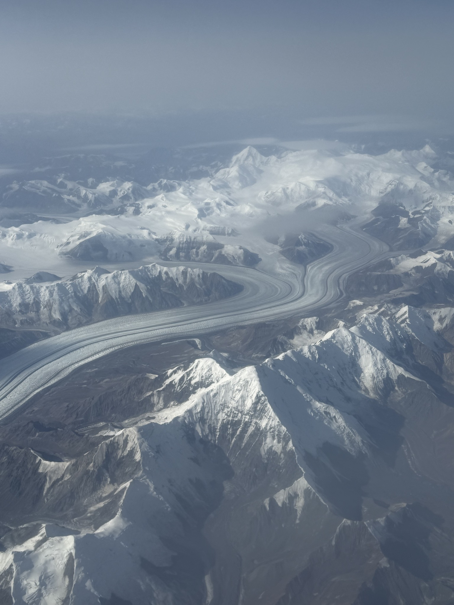Aerial glacier and mountain view from above Alaska.