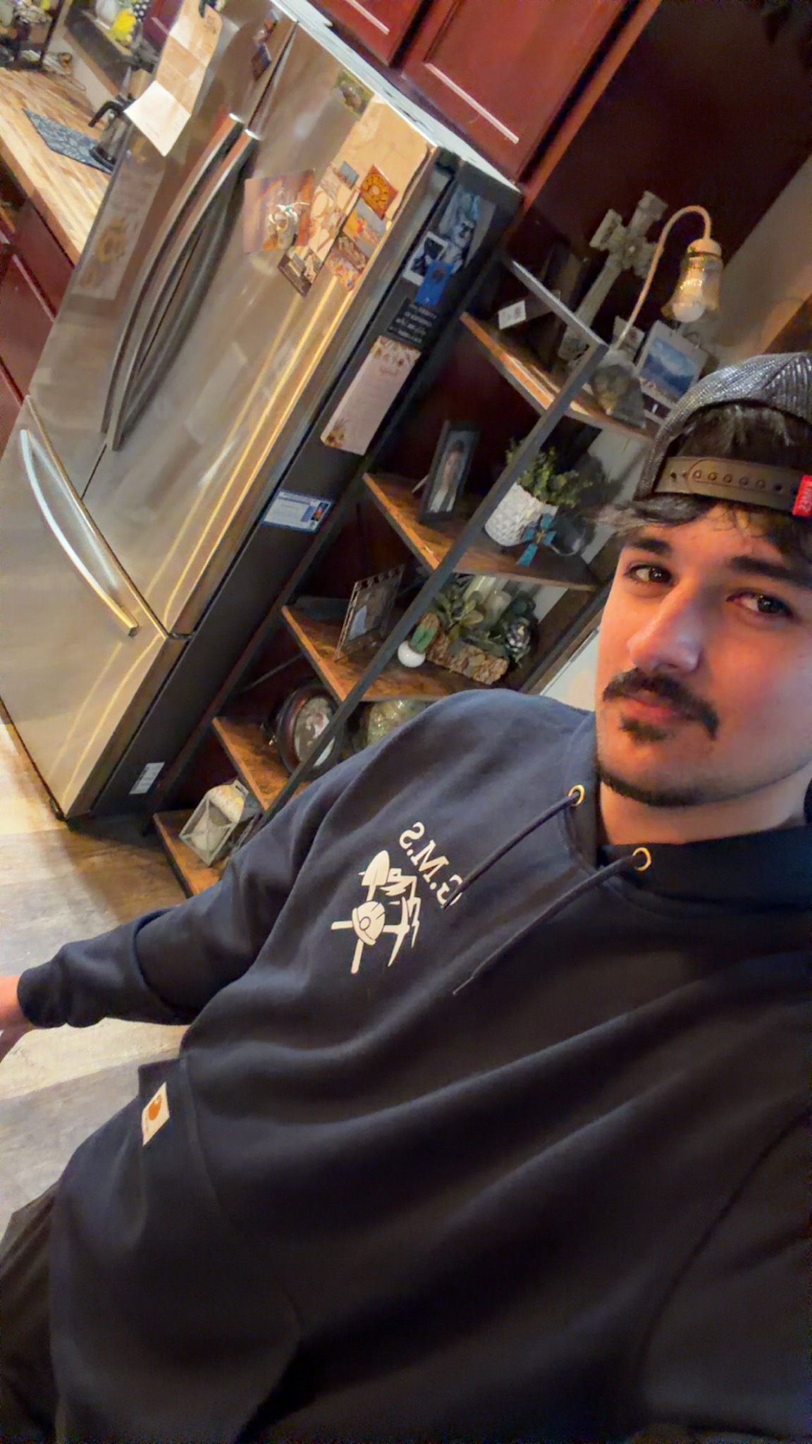 Front view of a GMS Mining hoodie being worn.